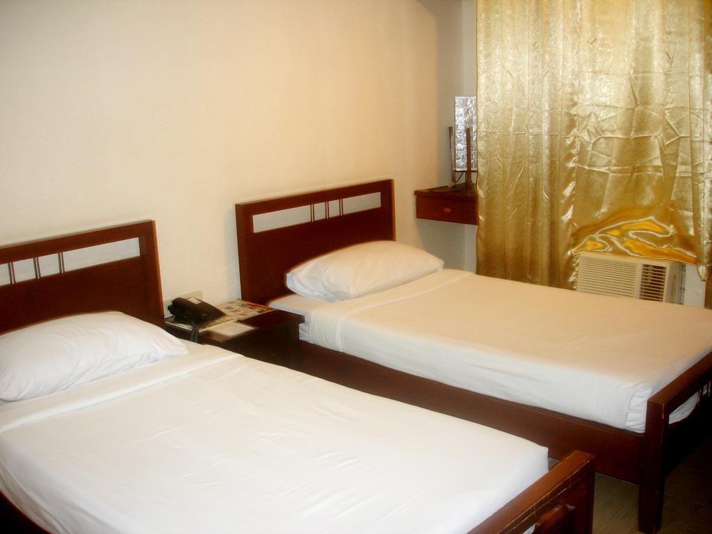 Roxas Midtown Hotell Rom bilde